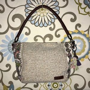 Trendy Sakroots handbag.